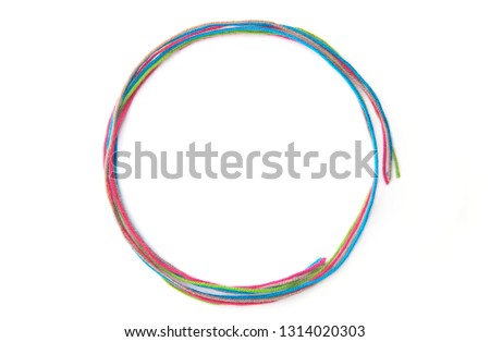 Colorful circle frame made of thread isolated on white background. Empty frame of cotton thread.
