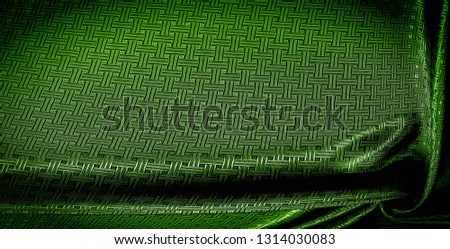 Background texture green silk fabric with a small checkered pattern. When you take home this green orchid brocade. Adding a 3D view to brocade. Thin and light, its flexible drape falls on some volume