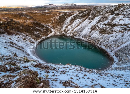 Frozen lake in the Kerid crater. Iceland