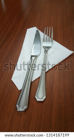 metal fork and knife napkin service