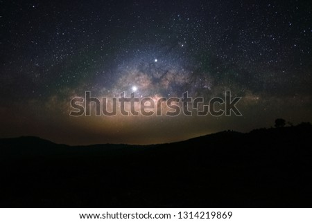 Conjunction of Venus and Jupiter in line with milky way galaxy background, Long exposure hight ISO noise in night photography. 