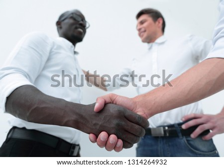 bottom view.confident handshake of business partners.