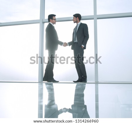 business background.handshake business partners .
