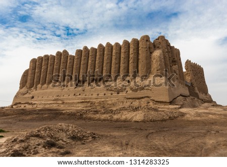 Major Kyz-Kala, a fortress with corrugated, as if pleated, walls, located in ancient Merv which was one of the major cities standing on a silkway route. Once was the capital of Turkmen-Seljuk Empire. Royalty-Free Stock Photo #1314283325