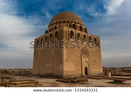 Mausoleum of Sultan Sanjar the ruler of a dynasty of the great Turkmen-Seljuks, Dar-ul-ahira (the other world) Recognised as a pearl of Islamic architecture  by its graceful correlation of details. Royalty-Free Stock Photo #1314283331