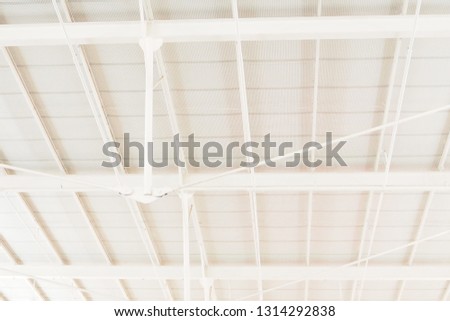 Modern metal roof in white color of building is well installed to protect the weather outside and to provide good interior design and architecture. Living, structural system, and industrial concept 