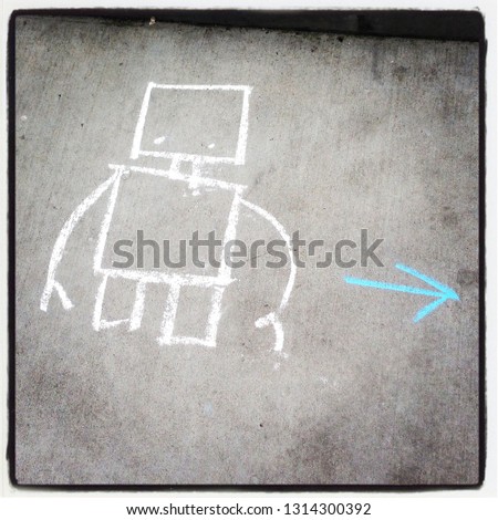 A small robot chalk outline on the sidewalk with an arrow pointing to the right.