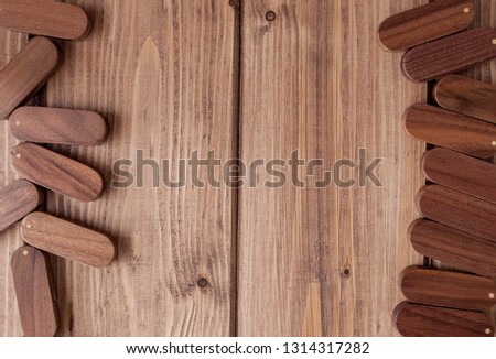 Many wooden usb flash drive on wooden background.