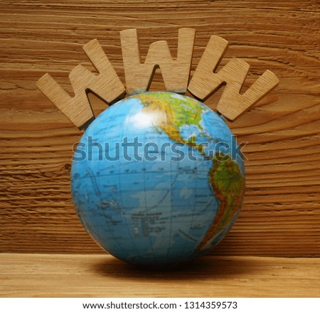  www - site  and globe map on wooden background. Empty copy space for inscription.                         