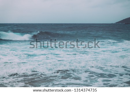 Retro vintage background image of ocean waves from the beach