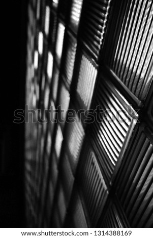 Black Squares

Black and White photo of a glass wall, taken in Brasov, Romania