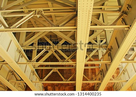 Iron Structure of the down side of the Blackfriars Railway bridge in London, UK seen from Themes Path under the bridge.It provide vertical and lateral support for the bridge