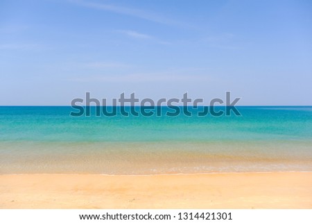 Tropical beach seaside and blue sky at Mai Khao beach of Phuket province, beautiful seascape in Thailand