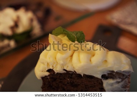 Blur picture of lemon tart in Italian restaurant in Bangkok Thailand 