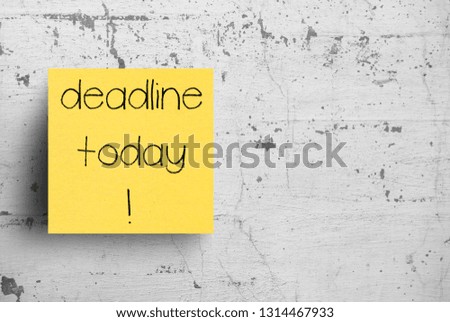 Sticky note on concrete wall, Deadline Today