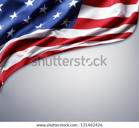 Closeup of American flag on plain background Royalty-Free Stock Photo #131462426