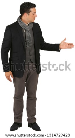 Stylish European man looking and gesturing to the middle right