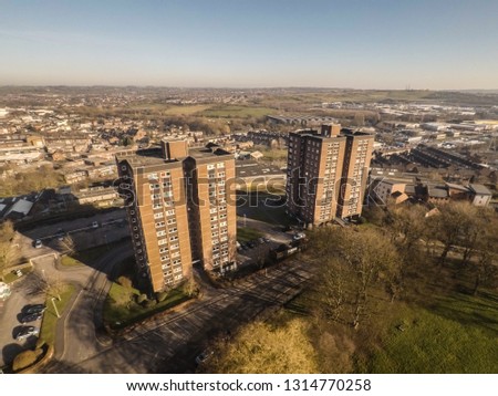 Aerial view of high rise tower blocks, flats built in the city of Stoke on Trent to accommodate the increasing population, housing crisis, immigration housing