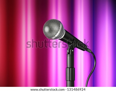 metal microphone isolated on a purple  background