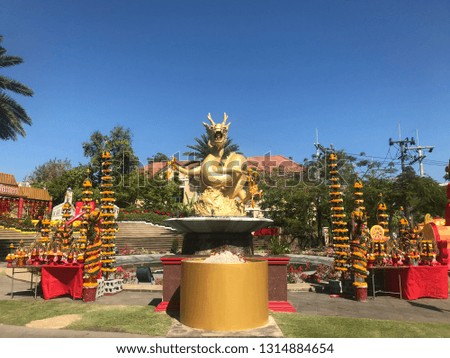 Gold dragon in Phuket Town, Thailand.People believe in Golden Dragon Monument.
