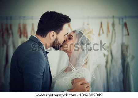 Beautiful model wedding couple in studio shop picture vintage style tone
