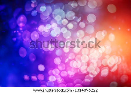 Abstract bokeh background. Christmas and New Year feast bokeh background with copyspace. Festive lights bokeh background.  Glitter vintage lights background with lights defocused