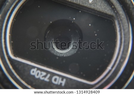 Macro shot of a dusty 720p HD desktop or laptop pc computer webcam lens. Privacy and spy concept Royalty-Free Stock Photo #1314928409
