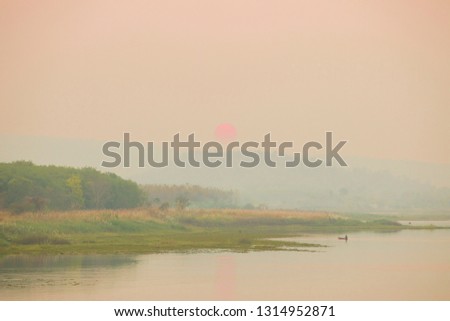 Beautiful landscape with high mountains,river sunset,Sunset or sunrise in the countryside,Beautiful natural background for graphic work