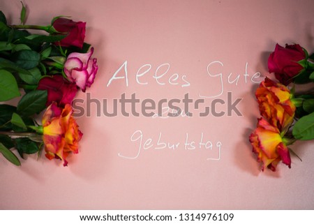 Happy birthday, with roses on pink background (alles Gute zum Geurtstag = Happy birthday)