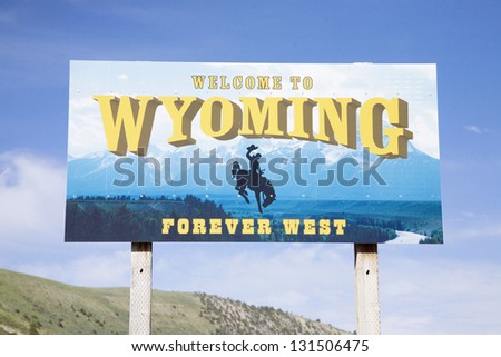 Close-up of welcome to Wyoming road sign