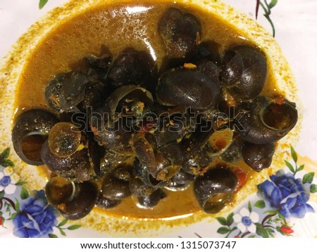 Tutut Stew, Traditional Food from Indonesia, Made from Tutut is a kind of freshwater slug. often consumed as a source of protein