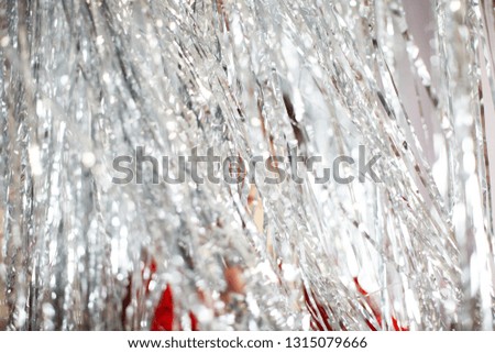 Silver background. Silver 
shining background. Меtafan. Bright silver long confetti