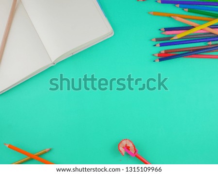 Flat lay,top view stationery for creative and students on green background with copy space 
art,education concept