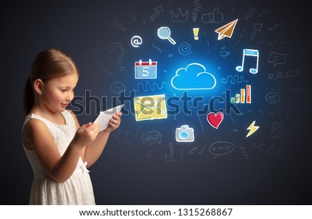 Adorable girl working on tablet with application and gadgets concept