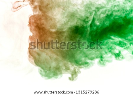 The texture of red smoke is like a watercolor on a white background with transitions of matter between green and orange like a chemical reaction for printing on t-shirt and clothes