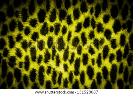 leopard texture background in black and yellow colors