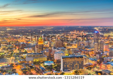 San Antonio, Texas, USA downtown city skyline from above just after sunset.