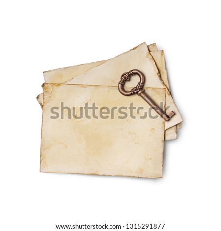 Empty old yellowed paper layout for vintage photo or post card with retro key isolated on white background