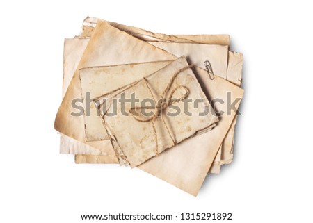 Top view on bunch of empty old vintage yellowed paper sheets or letters with rope isolated on white background