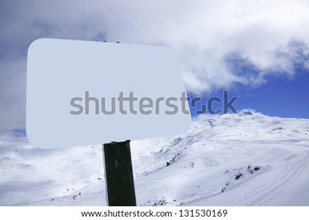 Panorama of the mountain with a metal sign