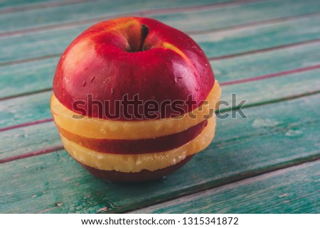Fruit hamburger, red Apple and pineapple. Concept: healthy and low-calorie feeding. The benefits of fruits, vitamins for health. Diet products
