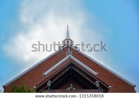 Church steeple with blue sky background