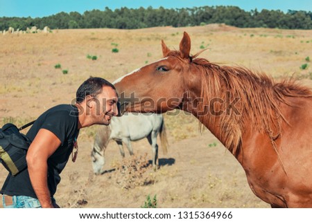 Friendship of a man and a horse, Sintra, Portugal