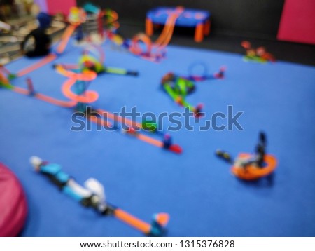 Blurred background of game play zone in the mall