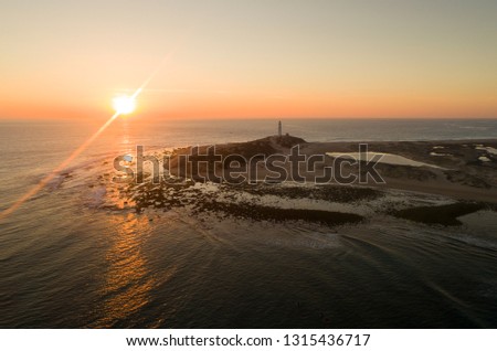 beautiful sunset in the marine lighthouse of tarifa andalusia Spain