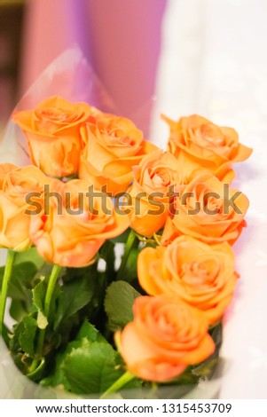 Large bouquet of orange roses	