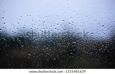 Drops on window blurred background
