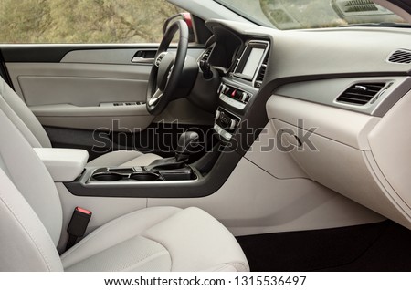 Modern car interior details, passenger side, white interior, no trade marks, modified interior in photoshop