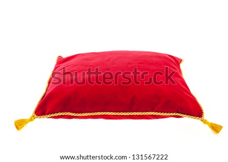 royal red velvet pillow with golden rope isolated over white background Royalty-Free Stock Photo #131567222