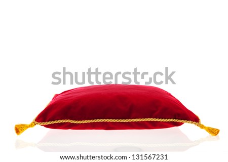 royal red velvet pillow with golden rope isolated over white background Royalty-Free Stock Photo #131567231